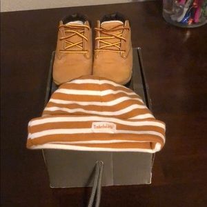 Infant/baby size 1 timberlands w/ matching beanie.